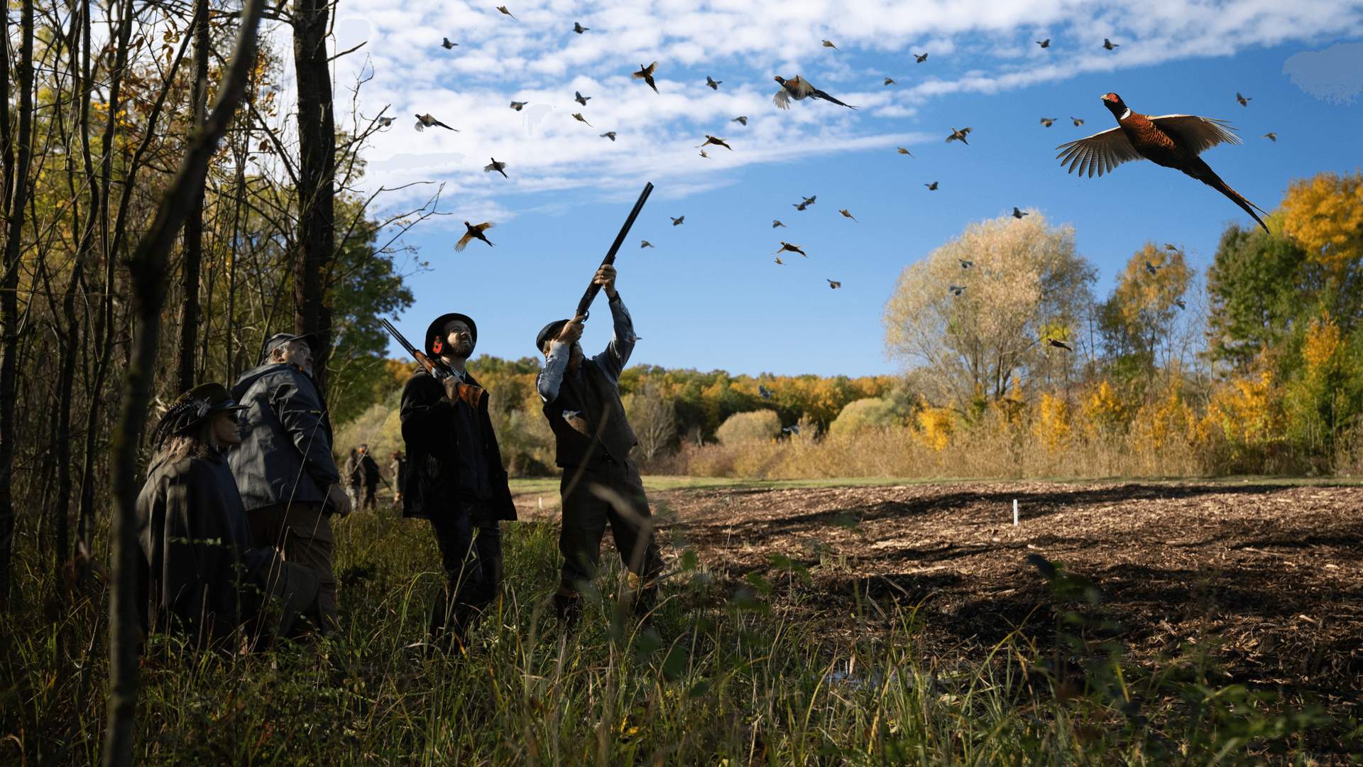 Group of people hunting pheasants